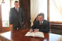 Macedonian President Gjorge Ivanov signs the commemorative book 