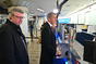 Premiér Andrej Babiš a vicepremiér Karel Havlíček si na Hlavním nádraží v Praze kupují jízdenky do Benešova, 25. února 2020.
